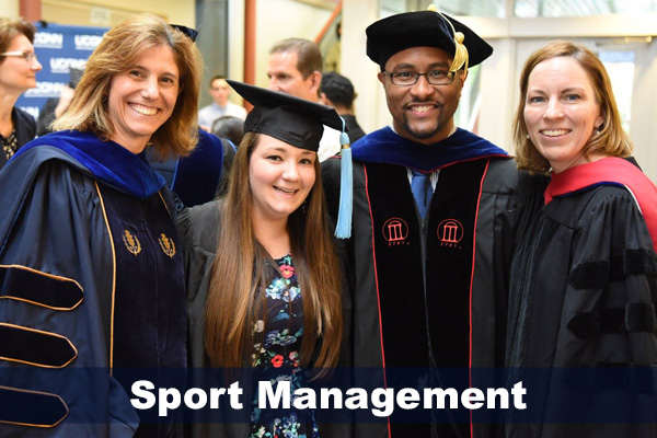Drs. Laura Burton, Joseph Cooper and Jennie McGarry with female graduate, 2016